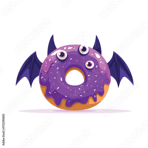purple frosted donut with bat wings and candy eyeballs halloween dessert