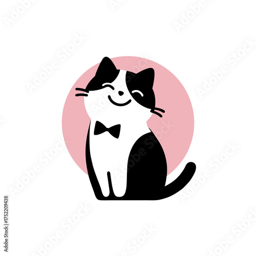 A happy black and white cat wearing a bow tie, with a pink circle