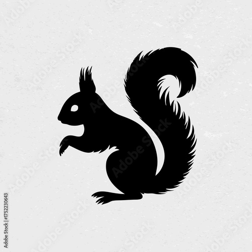 Black squirrel silhouette on a textured white background