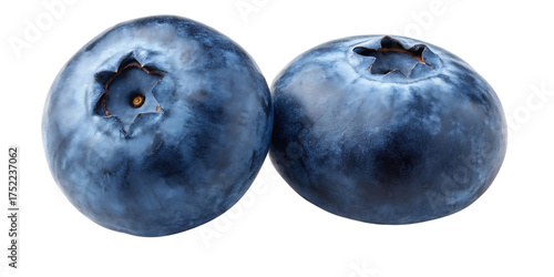 Two fresh and juicy blueberries isolated on a black background ready for healthy snacking or recipe additions showcasing vibrant colors