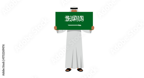A person wearing traditional attire holding up the Saudi Arabian flag.