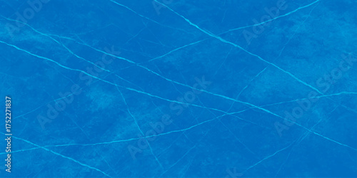 Clear, blue swimming pool water texture with ripples and reflections is a perfect abstract background for a summer surface pattern