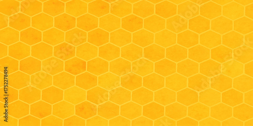 Golden yellow honeycomb texture with bee hexagon pattern isolated on a white background for a sweet design