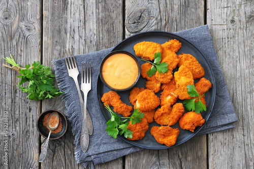 Slika na platnu breaded chicken breast chunks with dipping sauce