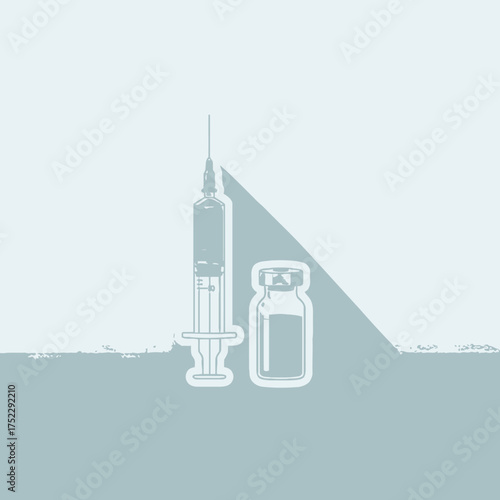 Medical syringe and vial representing vaccination and healthcare concepts.