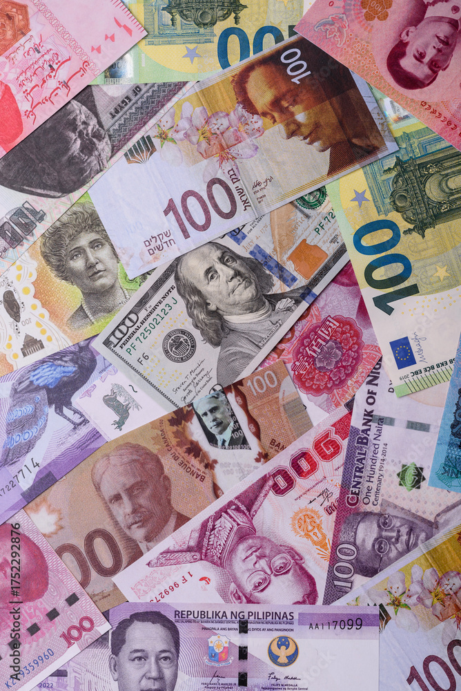 Obraz premium Paper money, banknotes of different countries as a business background. Paper money and cash