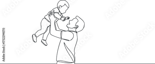 A loving father lifting his happy son in a joyful moment of playfulness and bonding.