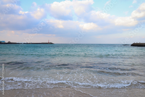 Scenic Coastal View of Seongsan Ilchulbong and the Beach in Jeju Island, South Korea