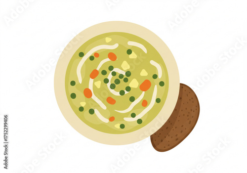 Green pea soup with vegetables served in a bowl and brown bread  