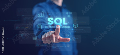 A developer touching a digital SQL interface representing Structured Query Language and database management technology. Ideal for coding, IT, and data analytics concepts.
