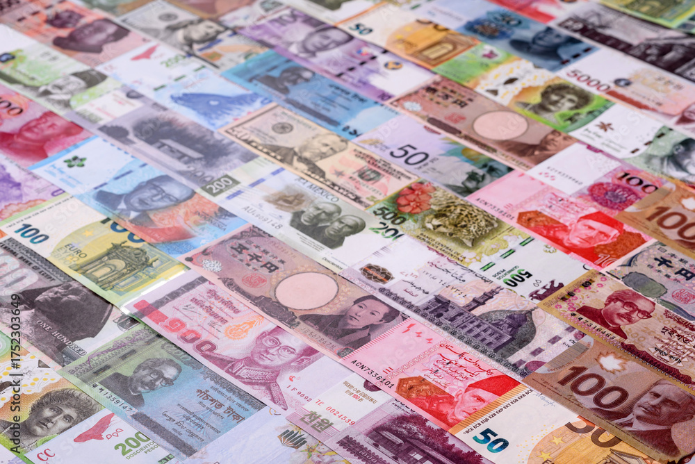 Obraz premium Paper money, banknotes of different countries as a business background. Paper money and cash