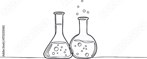 Two laboratory flasks with bubbling liquids representing scientific experimentation and chemistry.