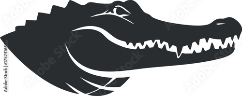 Silhouette of a crocodile head showcasing its sharp teeth and aggressive features.