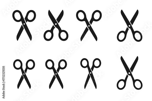 Set of eight black scissors icons in various orientations on white background
