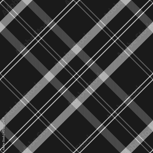 Classic black, gray, and white tartan plaid pattern for textile, fabric, wallpaper, and wrapping paper. A seamless vector background ideal for modern, and timeless decoration. Vector illustration.