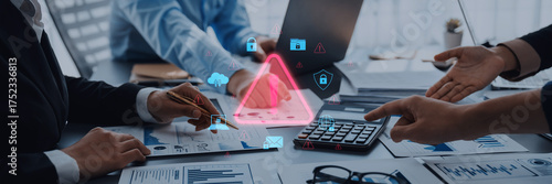 Professionals collaborating in a modern office, analyzing financial data and discussing risk management while incorporating digital security symbols for effective strategy planning. Trope