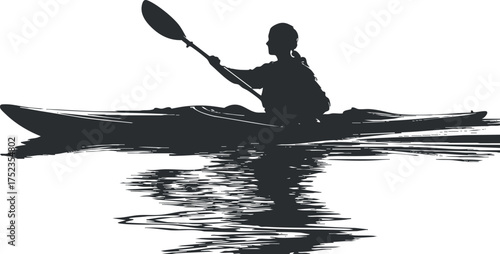 Silhouette of a person kayaking on calm water with a clear reflection.