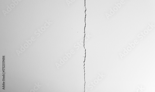 A crack in the plaster, a cracked white wall. A whitewashed wall, a damaged ceiling. A cracked white concrete wall.