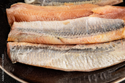 Herring fillet fish fresh seafood portion size natural product tasty snack fresh delicious gourmet food background on the table rustic top view copy space pescetarian diet