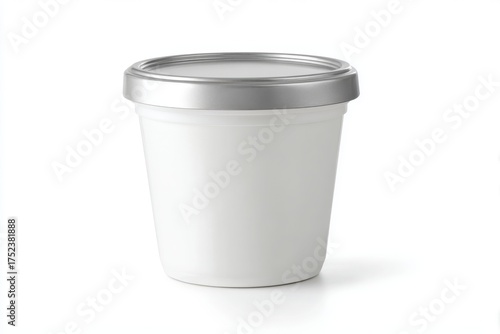 Wallpaper Mural A blank white plastic cup with a silver lid sits isolated on a white background, perfect for showcasing packaging designs for yogurt or other food products. Torontodigital.ca