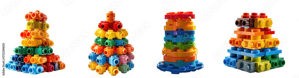 Obraz premium Four colorful abstract towers built from interlocking plastic construction toy pieces, isolated on transparent background