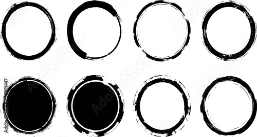 A versatile set of black ink brush stroke circles and round grunge frames. Collection of isolated vector stamp textures and design elements