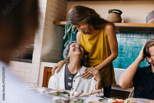 Bilde på lerret Family moments as grandmother smiles at granddaughter