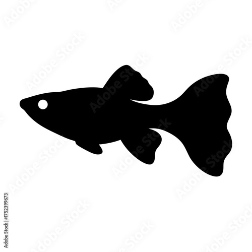 Silhouette of a vibrant guppy fish showcasing its distinctive fins and flowing tail a perfect aquatic symbol.