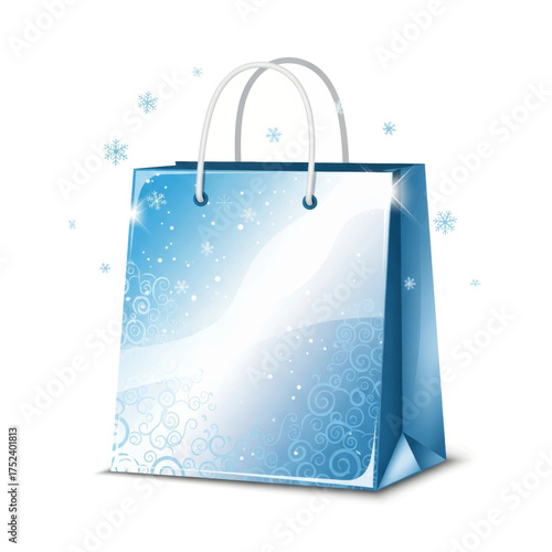 A blue gift bag with a wintery snowflake design and white handles, isolated on a white background.