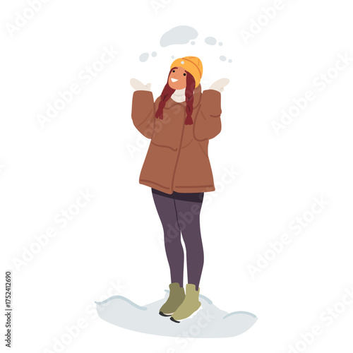 Young teenage girl having fun outdoors throwing snow, enjoying winter activities and playtime