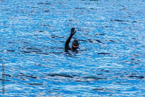 Diver preparing for the underwater diving. Extreme hobby
