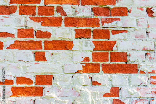 Old wall of red bricks for the background