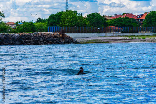 Diver preparing for the underwater diving. Extreme hobby
