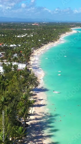 Wallpaper Mural Tropical coastline with resorts, palm trees and caribbean sea. Travel destinations. Dominican Republic. Aerial view Torontodigital.ca