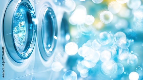 Washing machine drums with motion blur and light bokeh creating bubbly clean effect