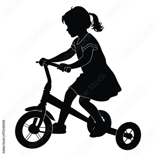 Girl riding tricycle silhouette