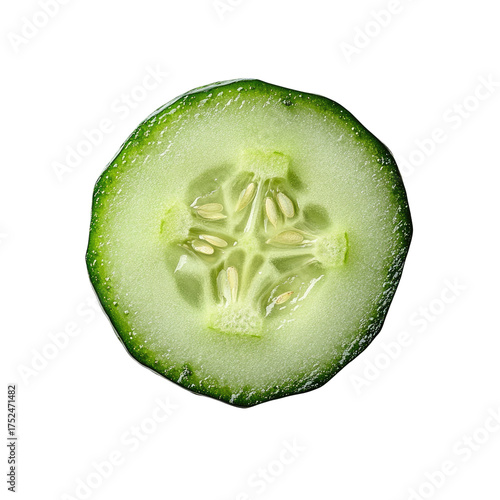 Translucent cucumber slice showing seeds in star pattern on black backdrop
