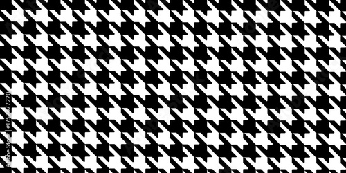 Black and white houndstooth pattern. Puppytooth background. Checkered textile motif. Plaid, scarf or cloth fabric print. Retro tweed textile design. Classic ornament. Vector graphic illustration.
