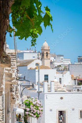 Beautiful old stone trulli houses with conical roofs in Alberobello, Puglia, Italy.