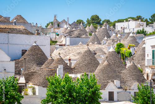 Beautiful old stone trulli houses with conical roofs in Alberobello, Puglia, Italy.