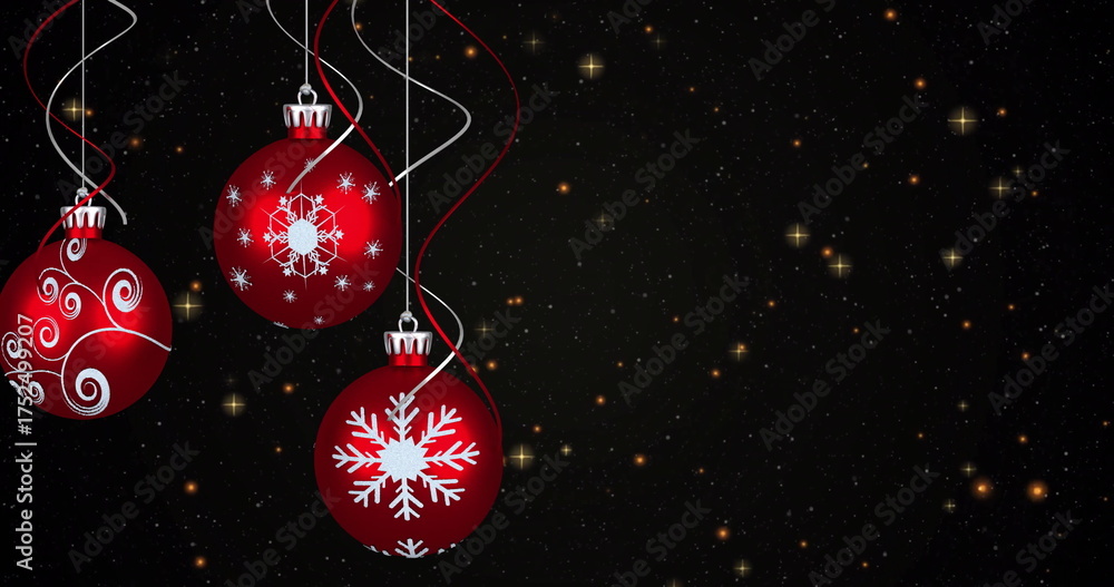 Fototapeta premium Image of yellow stars over christmas baubles