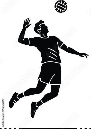Silhouette of a male volleyball player spiking the ball during a game