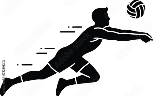 Silhouette of a volleyball player diving to hit the ball