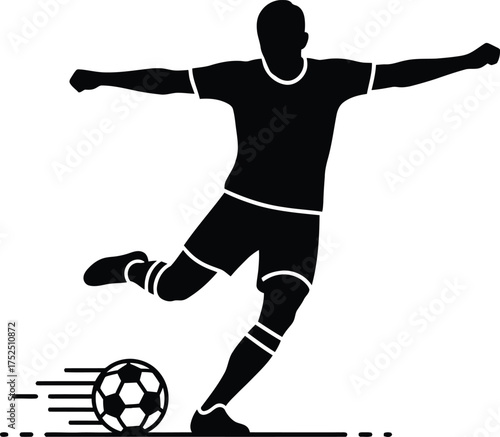 Silhouette of a soccer player kicking a ball in motion