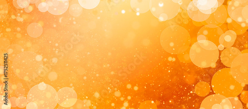 Abstract New Years Party Gold and Orange Abstract Background with Sparkling Glitter and Defocused Bokeh Lights Bubbles