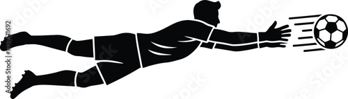 Soccer goalkeeper diving to save a fast moving ball