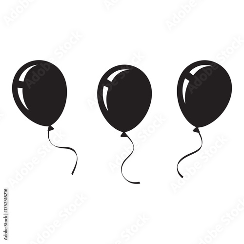 Elegant Black Balloons Gracefully Floating Against a Clean White Backdrop Creating a Festive and Minimalist Composition