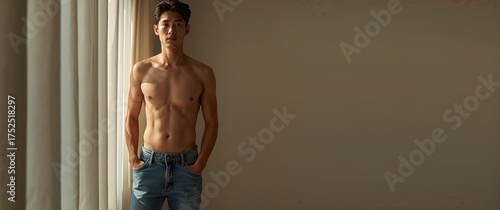 Handsome Asian man with toned body posing near curtains. Generative AI