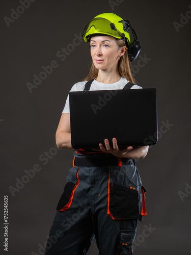 Woman engineer with laptop....