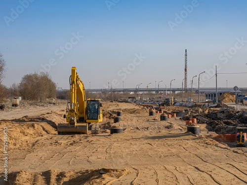 Road construction. Excavato...